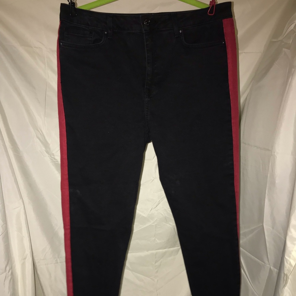 Black jeans with flattering red side stripe!